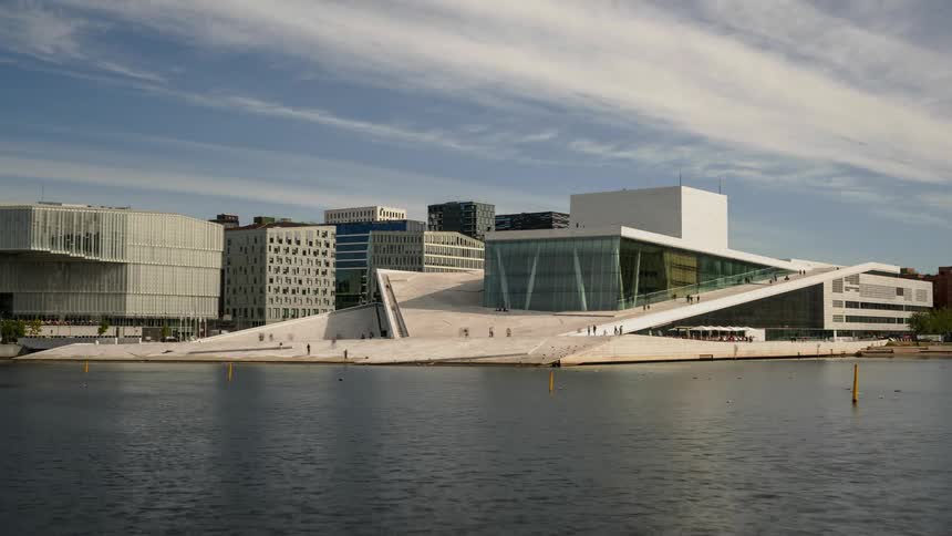 Time lapse of visitors walking on the oslo opera house