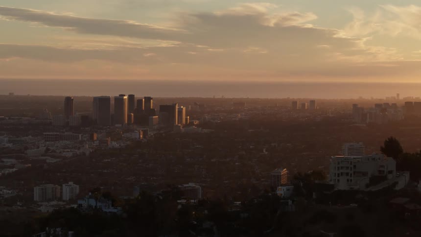 Aerial view of the sun setting on Beverly Hills and West Los Angeles