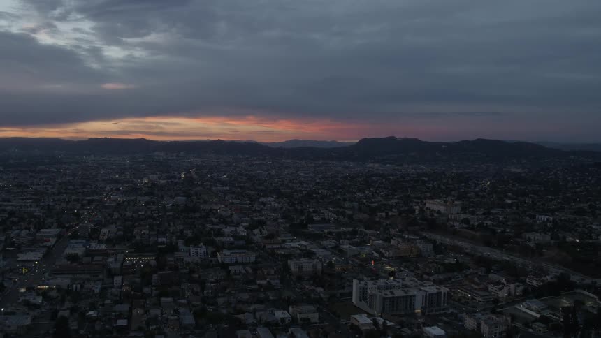 Blue hour aerial view of East Los Angeles and the Hollywood Hills at sunset