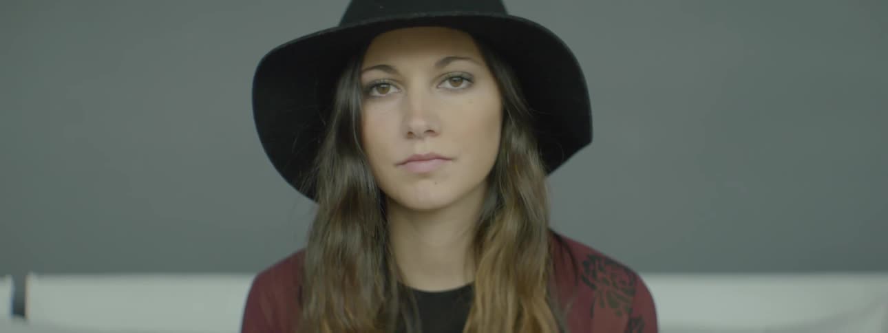 Close up of a woman who looks down
