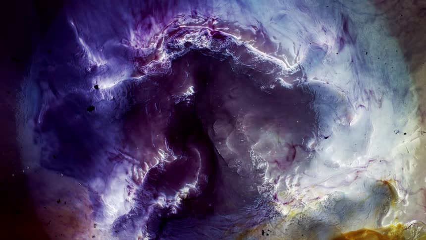 Water rolls churns and flows in a colorful glowing circle