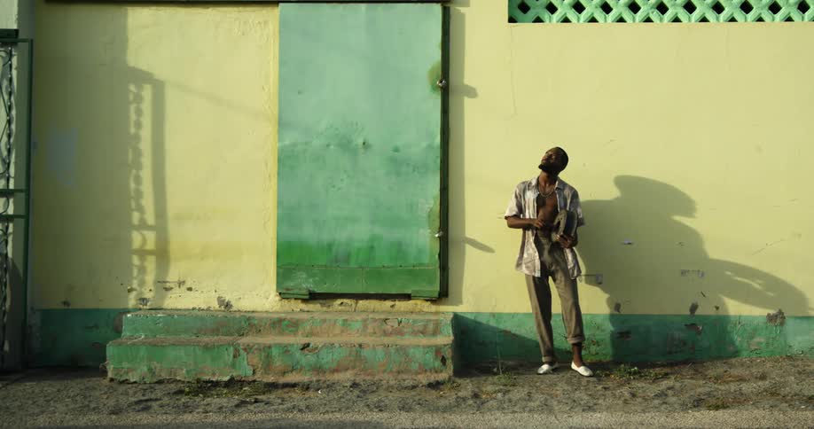 A man standing in front of a building