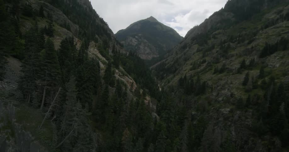 Panning reveal shot of a mountaintop