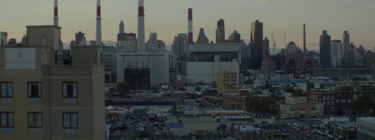 Buildings of a city at dusk