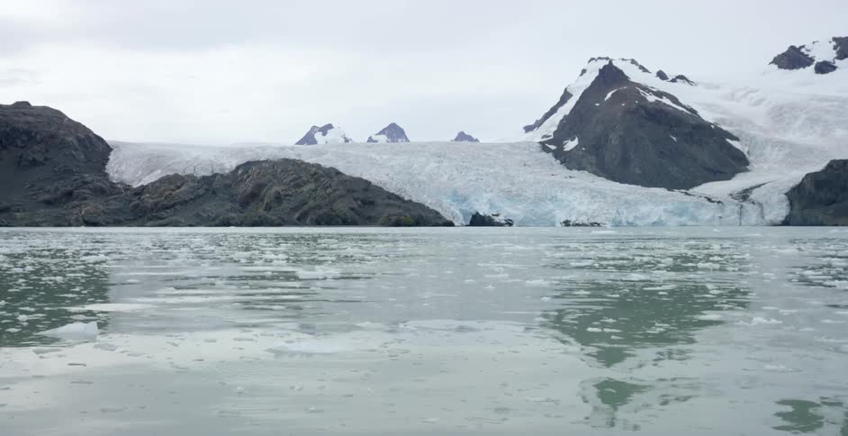 Water flowing past a glacier