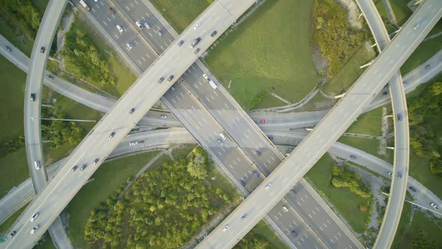 Traffic flows like clockwork through a symmetrical highway interchange