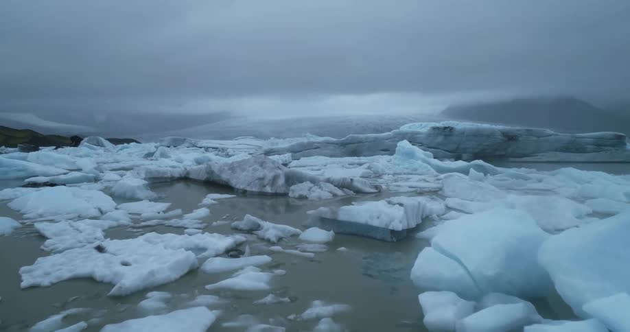 Broken pieces of snow and ice fill the top of the sea