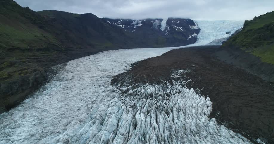 The river on the mountain is completely frozen over