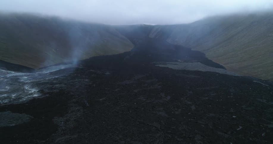 An aerial view of steam in a volcano