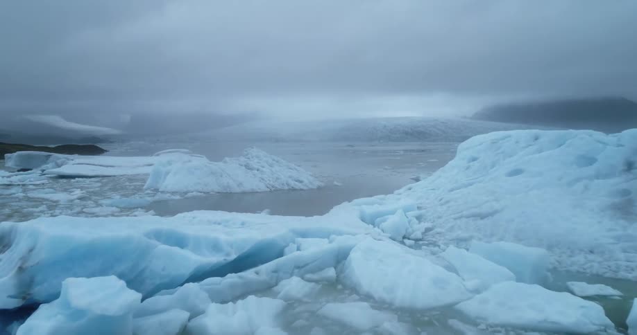An aerial view of a glacier in the arctic