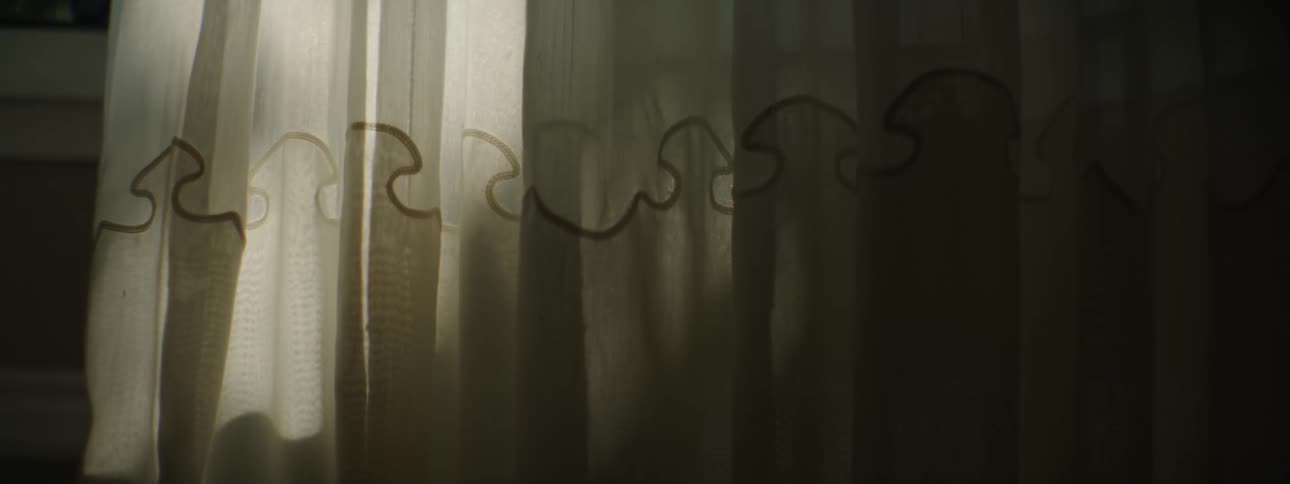 A view of shadows from a curtain