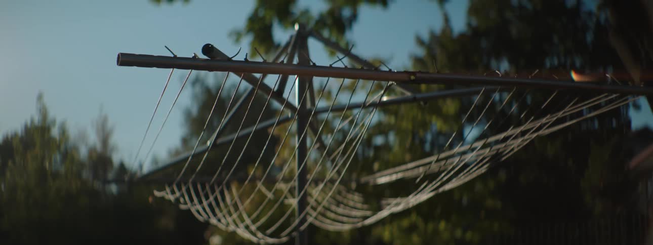 A view of a laundry drying line outdoors