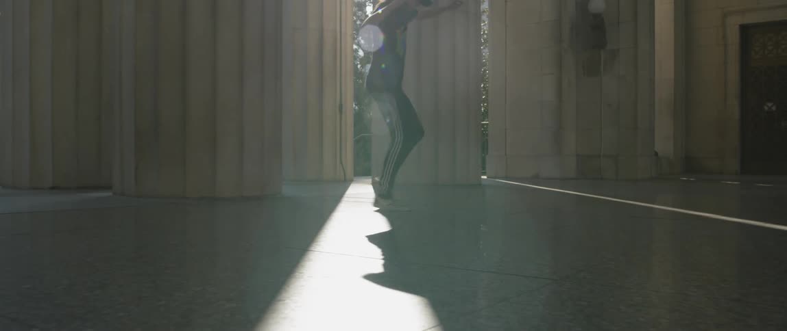 Man Dancing Around The City