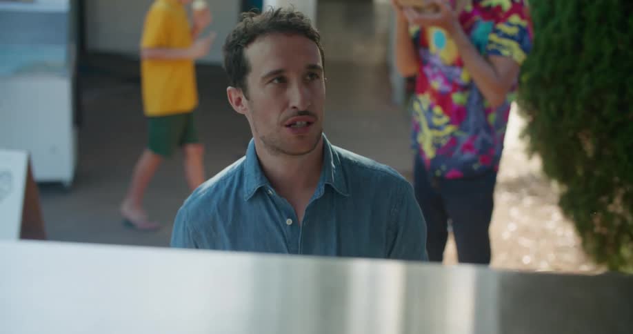 Man ordering food from a food truck at morning