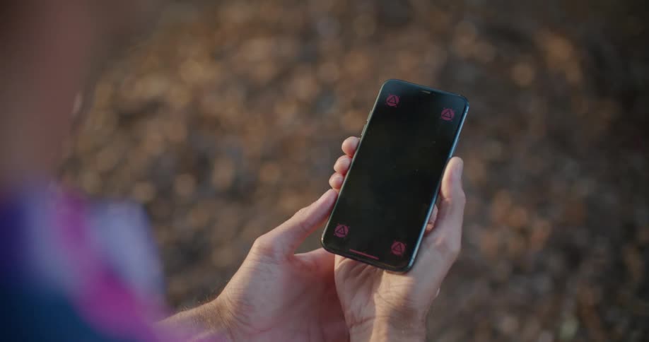 A person is holding a cell phone