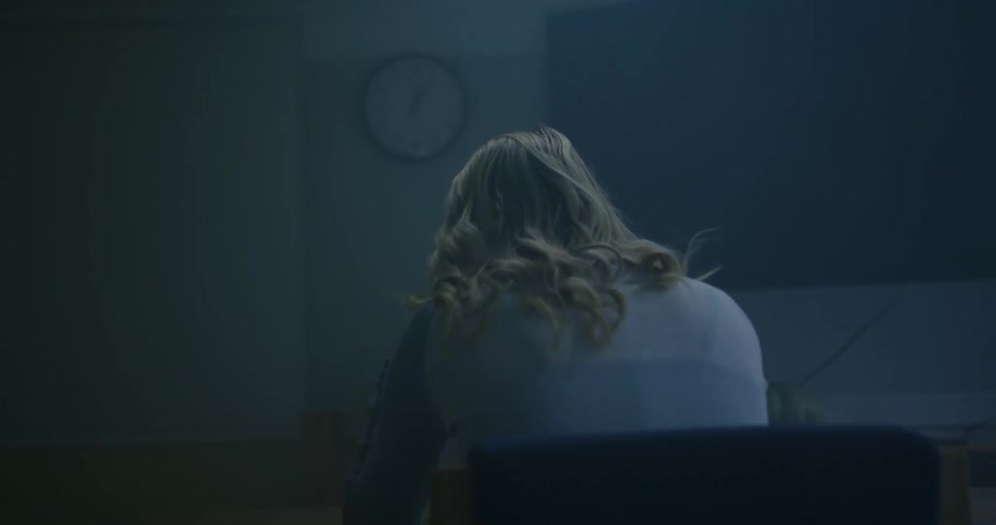 A woman sitting at a desk