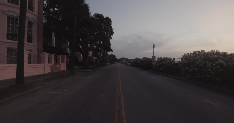 Empty street on a residential neighborhood at sunset