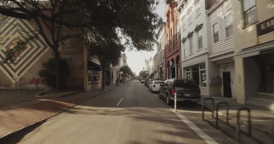The city street is lined with buildings