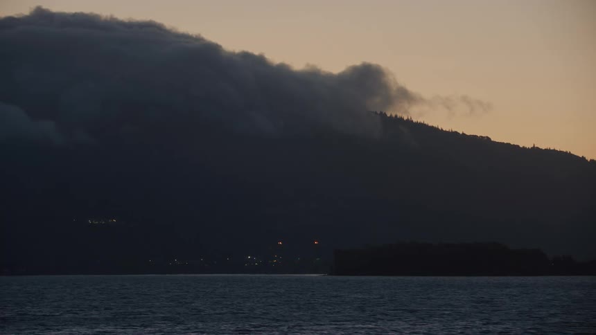 Early morning fog obscures the Columbia River and the the bridge that connects Hood River and White Salmon