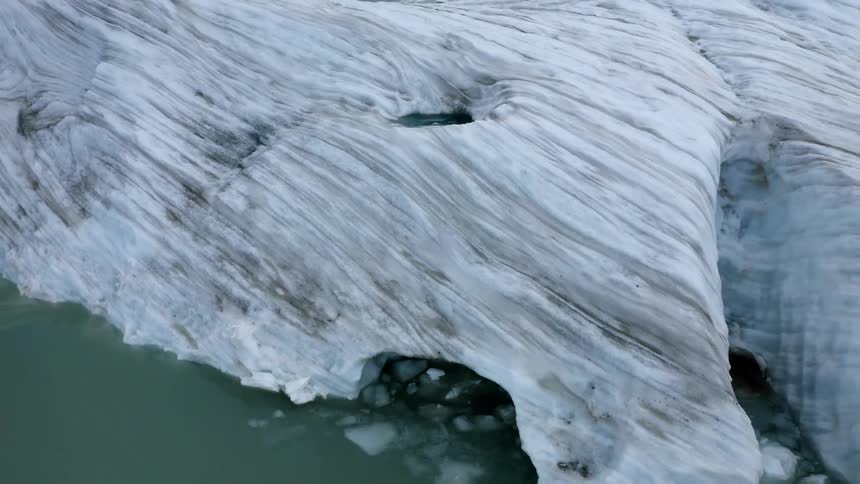 Aerial view of iceberg floating in lake