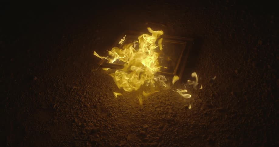 A frame is burning on the ground