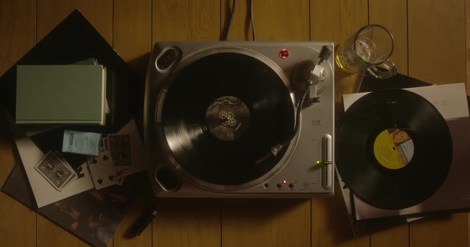 Aerial view of a turntable spinning a record