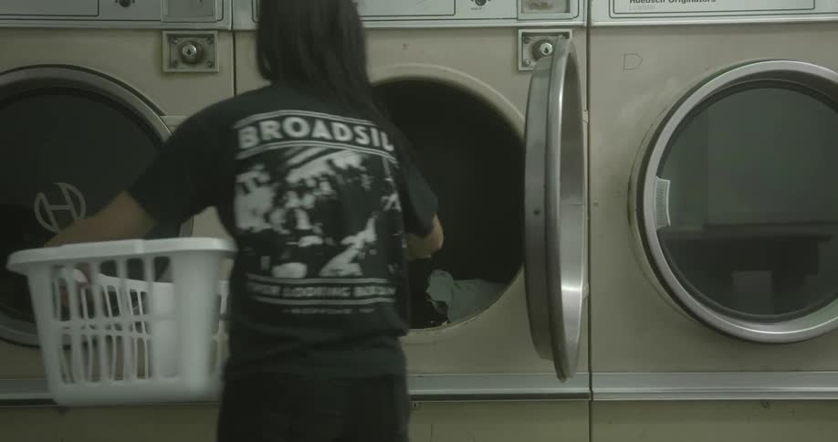 Person emptying a public dryer