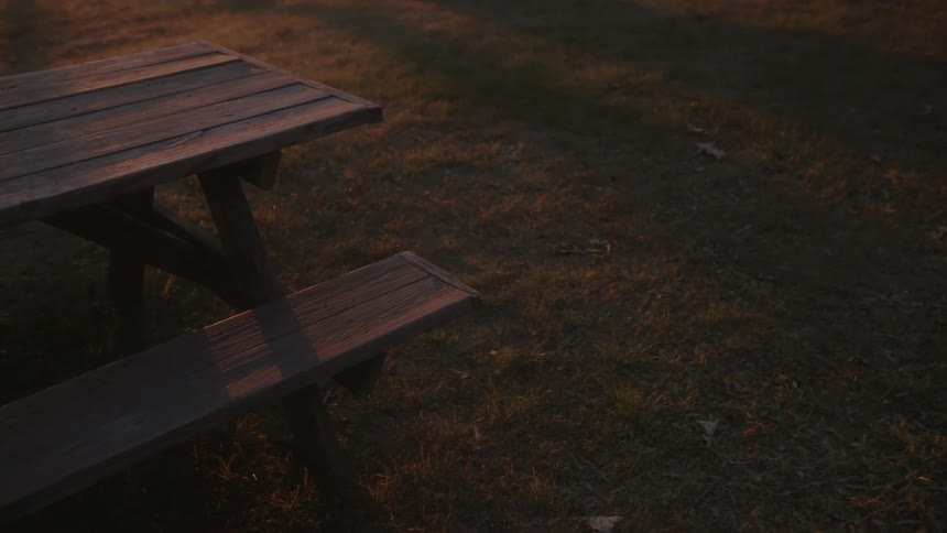 A park bench at sunset