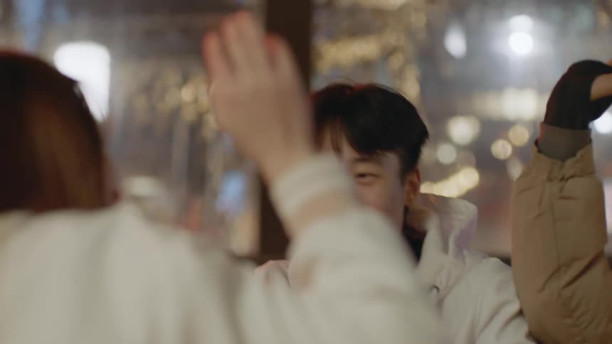 Friends talk and give each other high fives