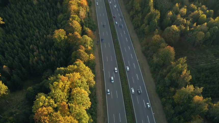 Vehicles travel on the long highway