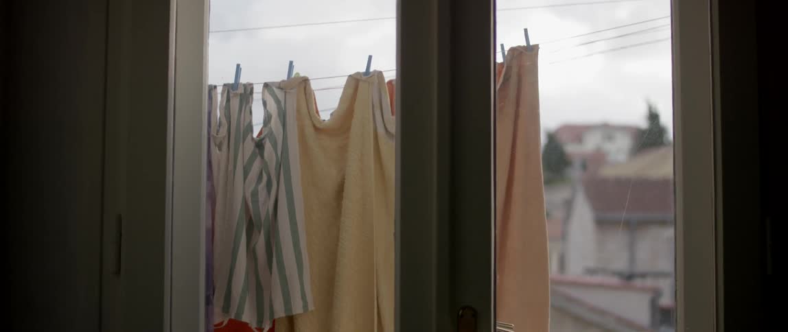 Laundry hanging outdoors on a clothesline to dry