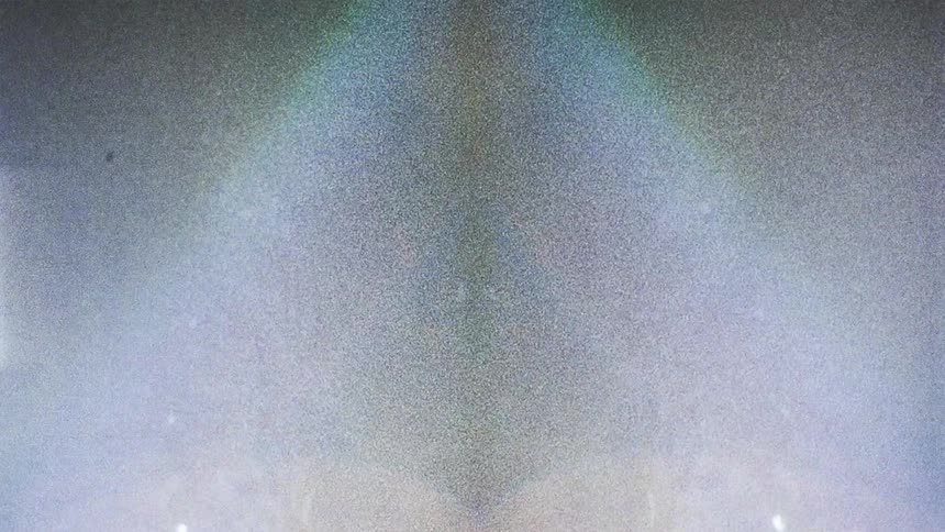 A kaleidoscope of grainy images and light