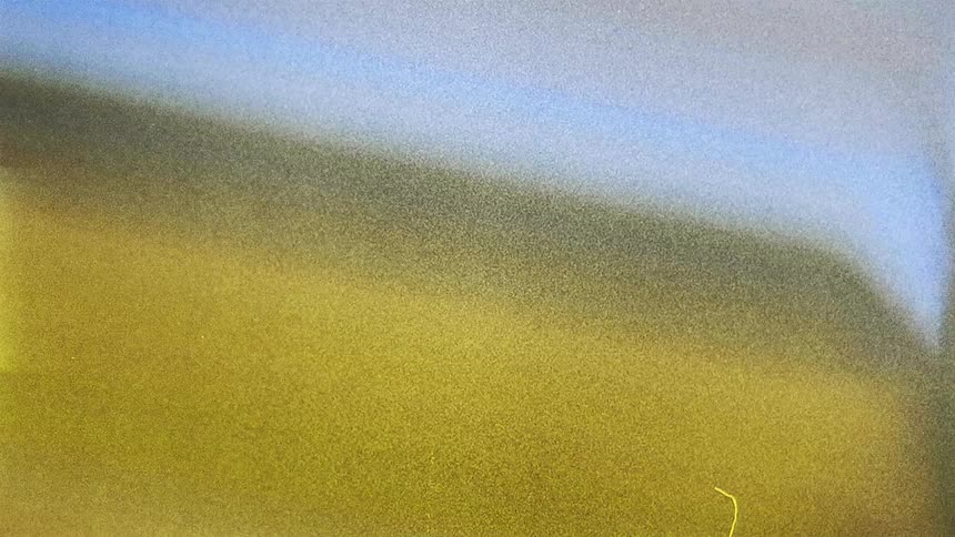 Blurry blue contrasts with yellow and orange streaks