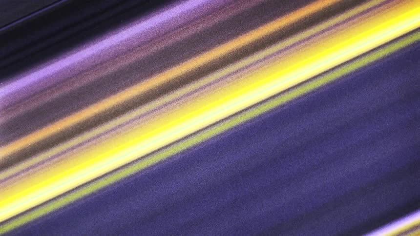 Multiple layers in various colors flow diagonally across digital image