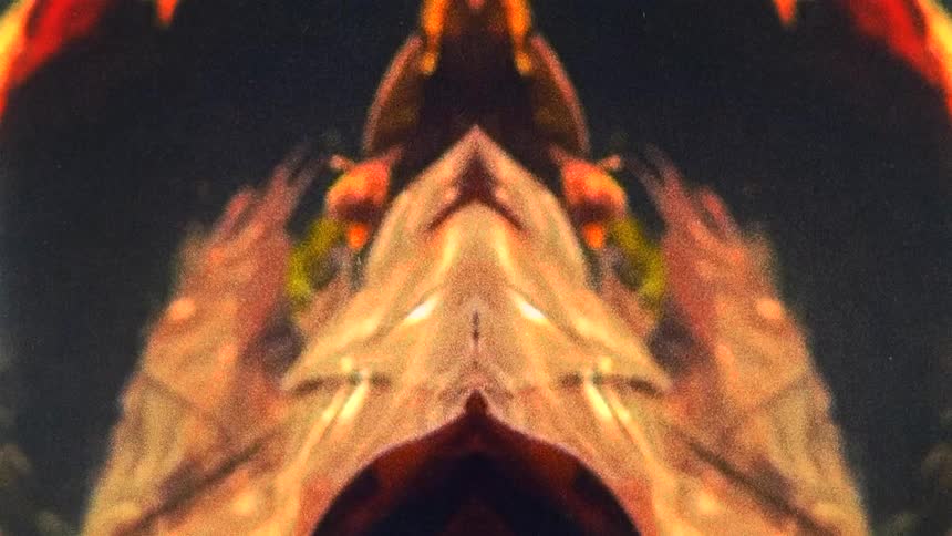 Mirror reflected image of flowing water caught on vintage film