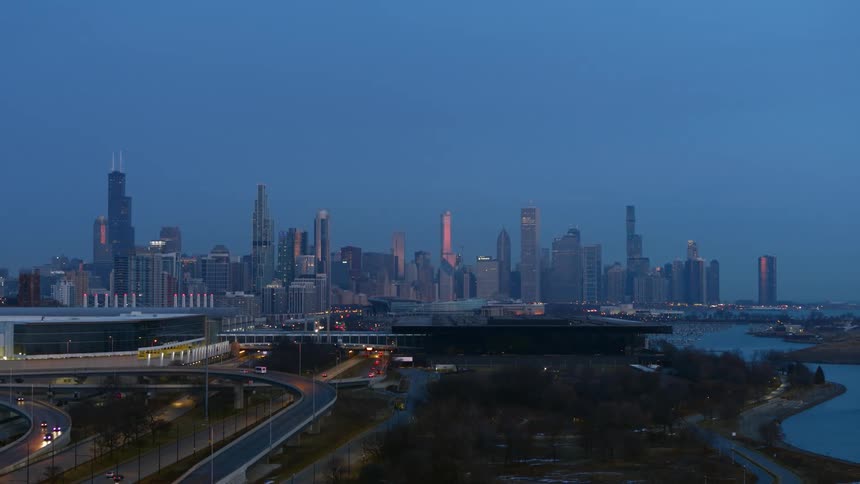 An aerial view of the chicago skyline at dusk evening