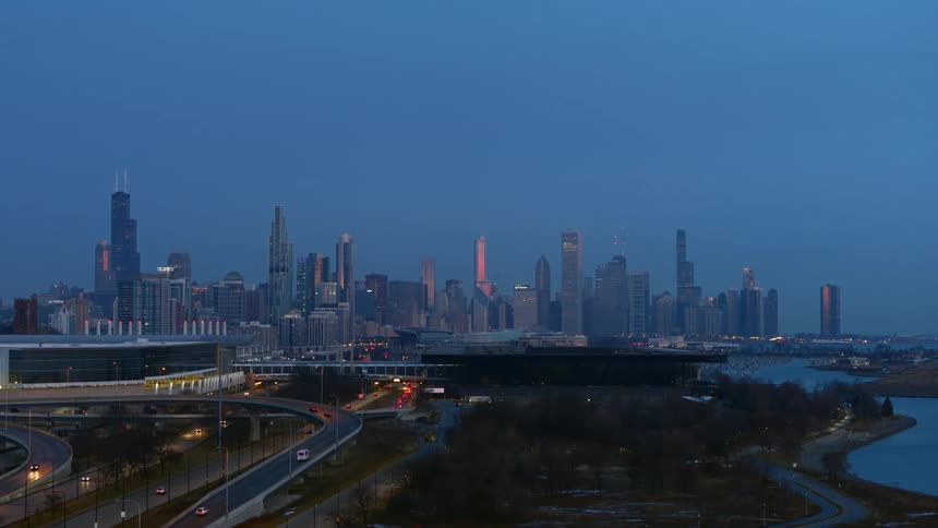 Aerial view of skyscrapers on the city skyline at night