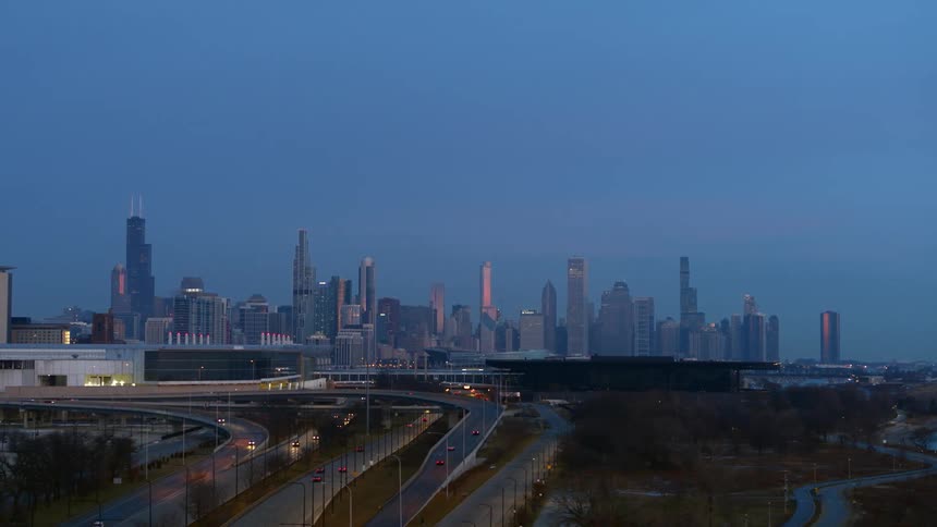 The sun is setting on the city