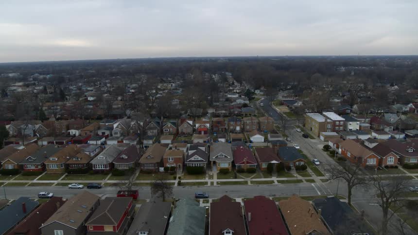 Aerial view of a residential neighborhood with houses close together