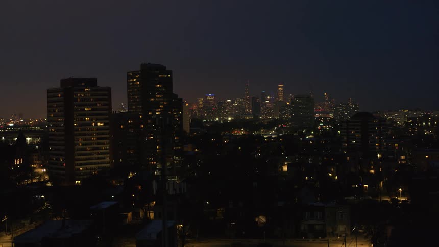 The city is brightly lit at night