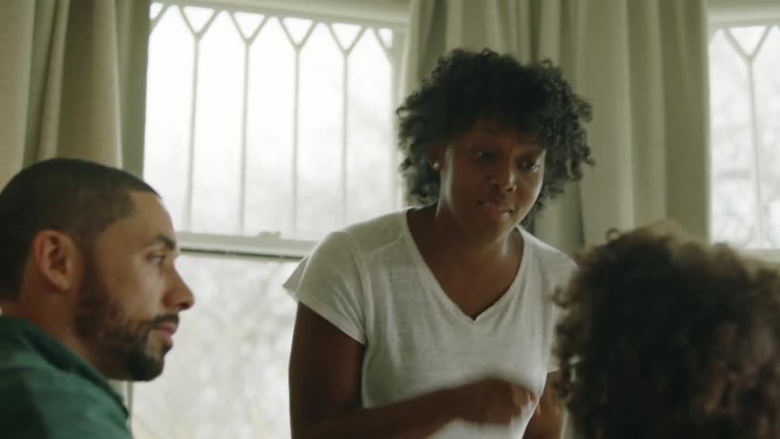 Family talking in a room