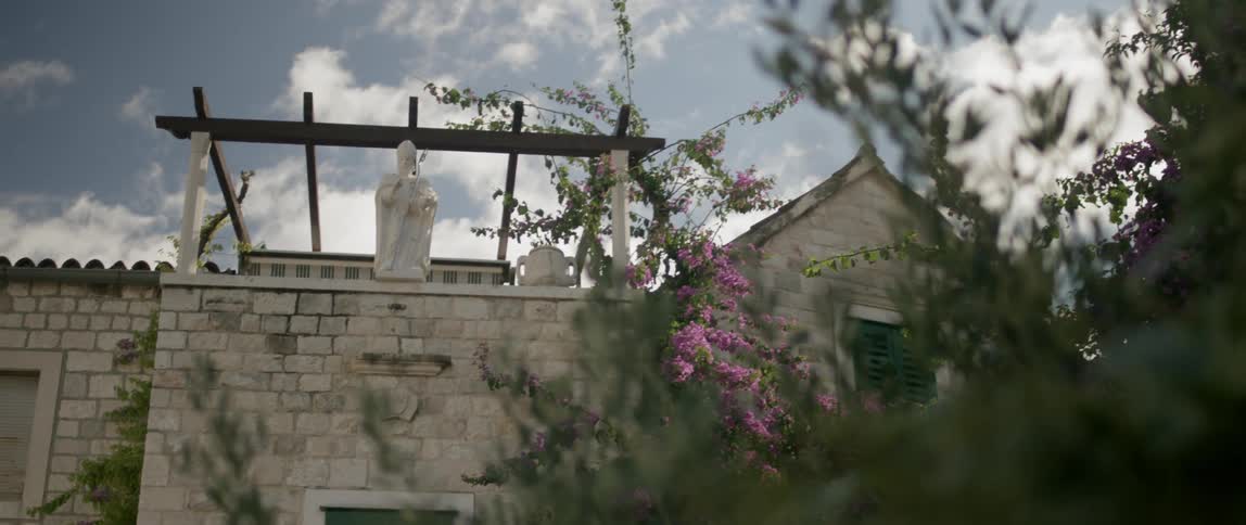 A statue is on the roof
