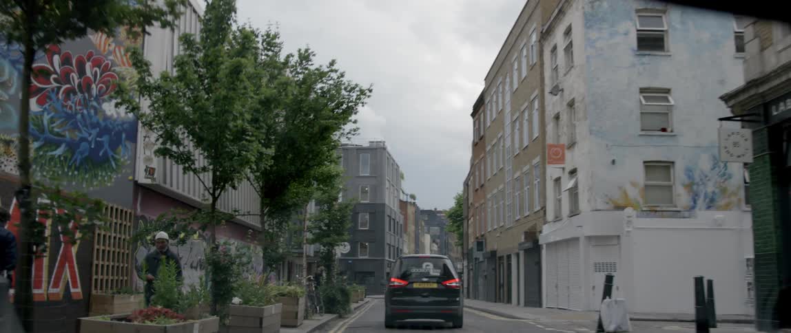 First-person view of driving along a city street