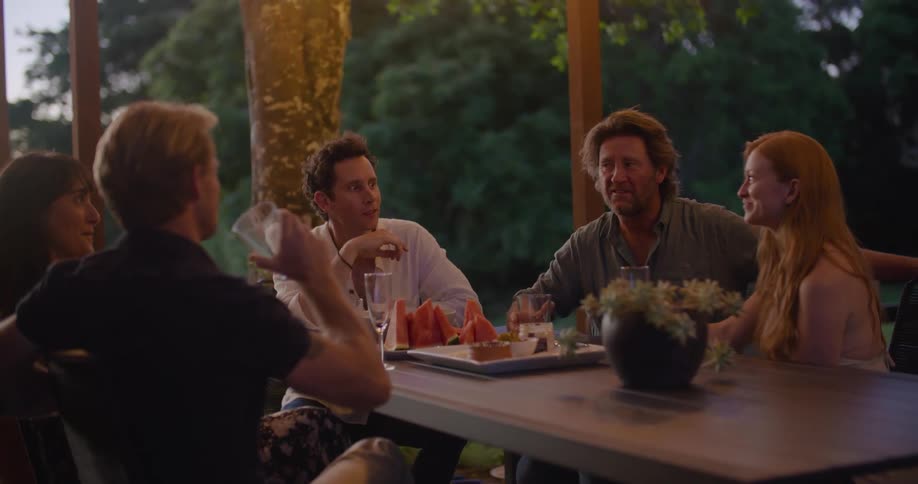 Group of people eating and drinking