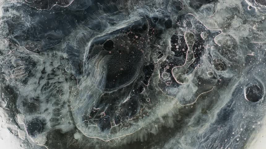 Abstract footage of liquids mixing together