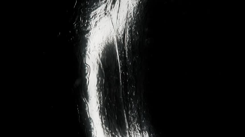 A view of a black and white item rotating digitally
