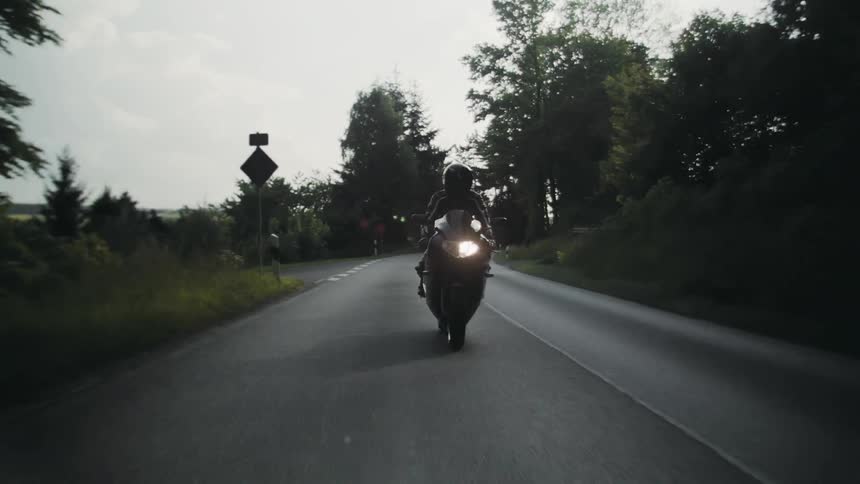 Girl Riding Motorbike