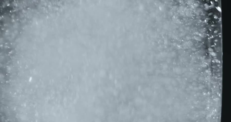 Bubbles spray in a body of water