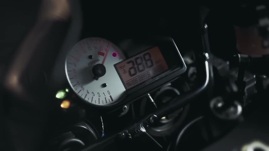 A machine turns on and a gauge moves