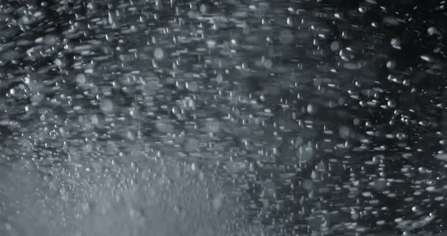Bubbles rise in some dark water